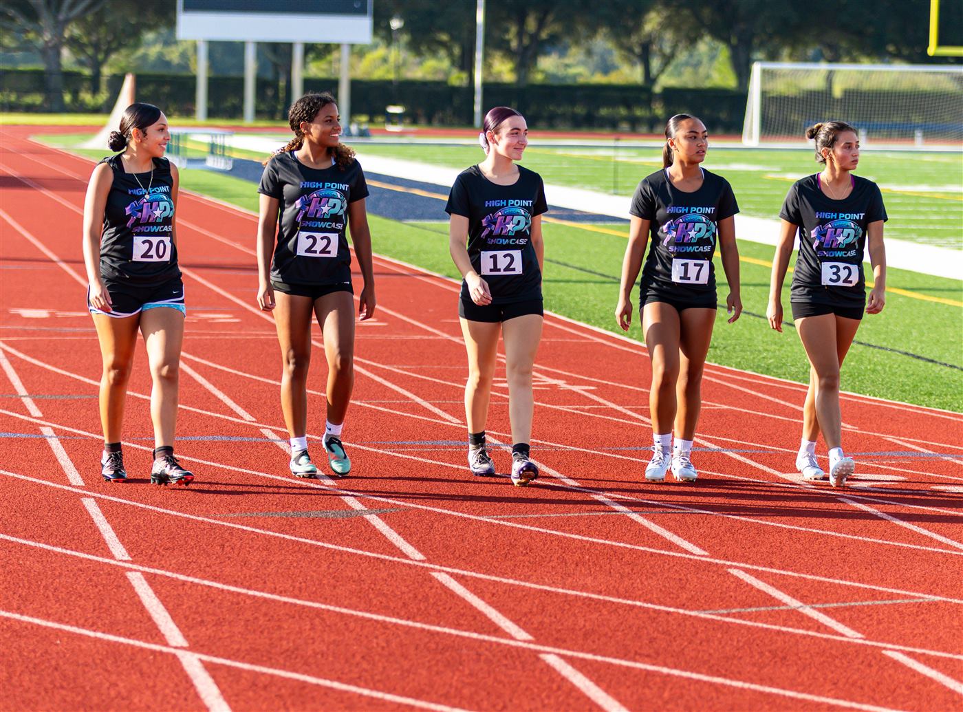 Athletes walking the track at the High Point Showcase