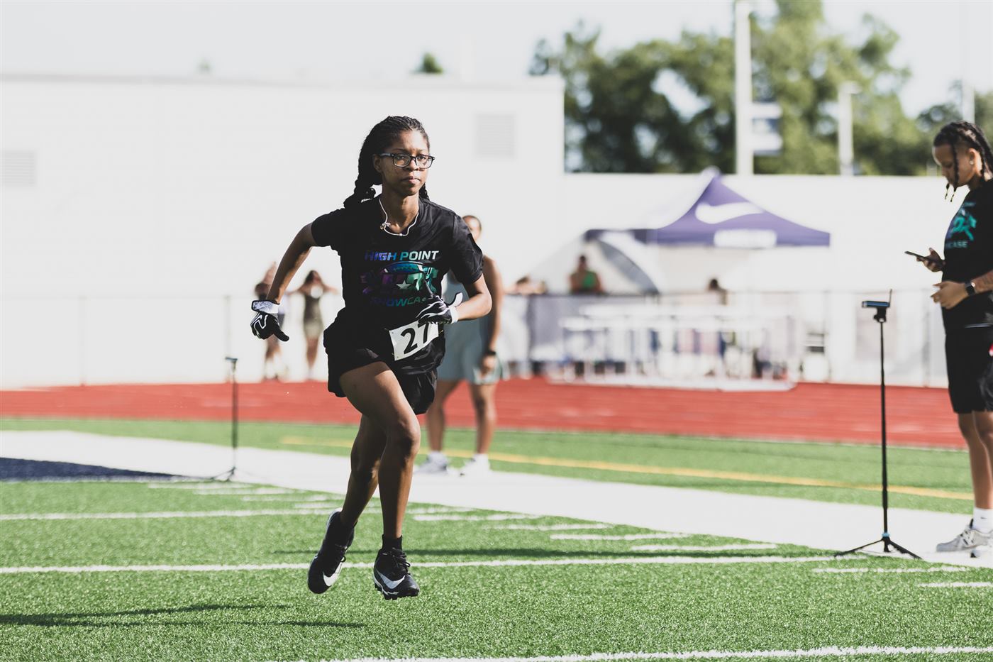 Athletes running a position drill
